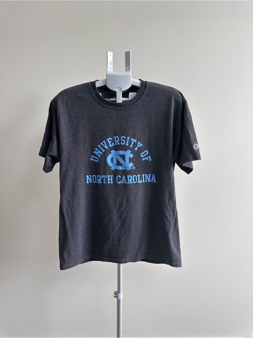 Champion Black Short Sleeve Tee with Carolina Blue UNC Logo